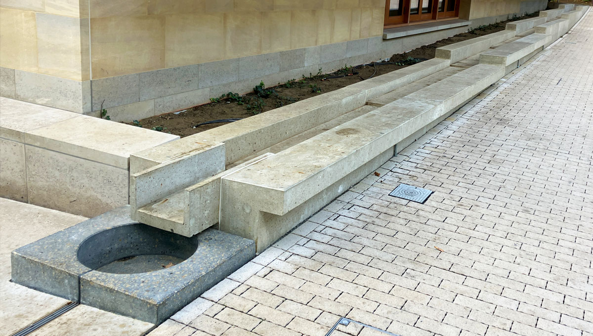 Drainage rill feeding a basin at the Natural History Museum, London with the Vico Visual Concrete drainage rill running down both sides