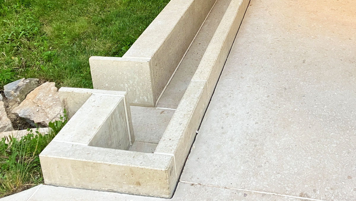 Drainage rill feeding a basin at the Natural History Museum, London with the Vico Visual Concrete drainage rill running down both sides