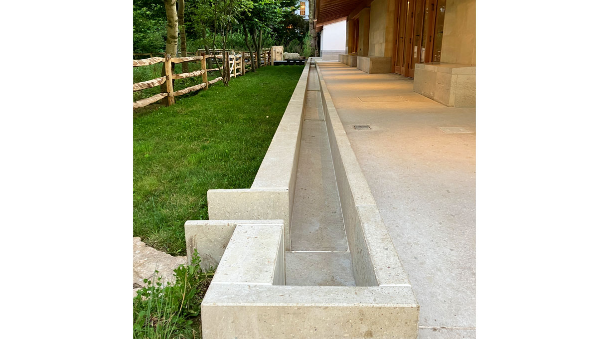 Drainage rill feeding a basin at the Natural History Museum, London with the Vico Visual Concrete drainage rill running down both sides