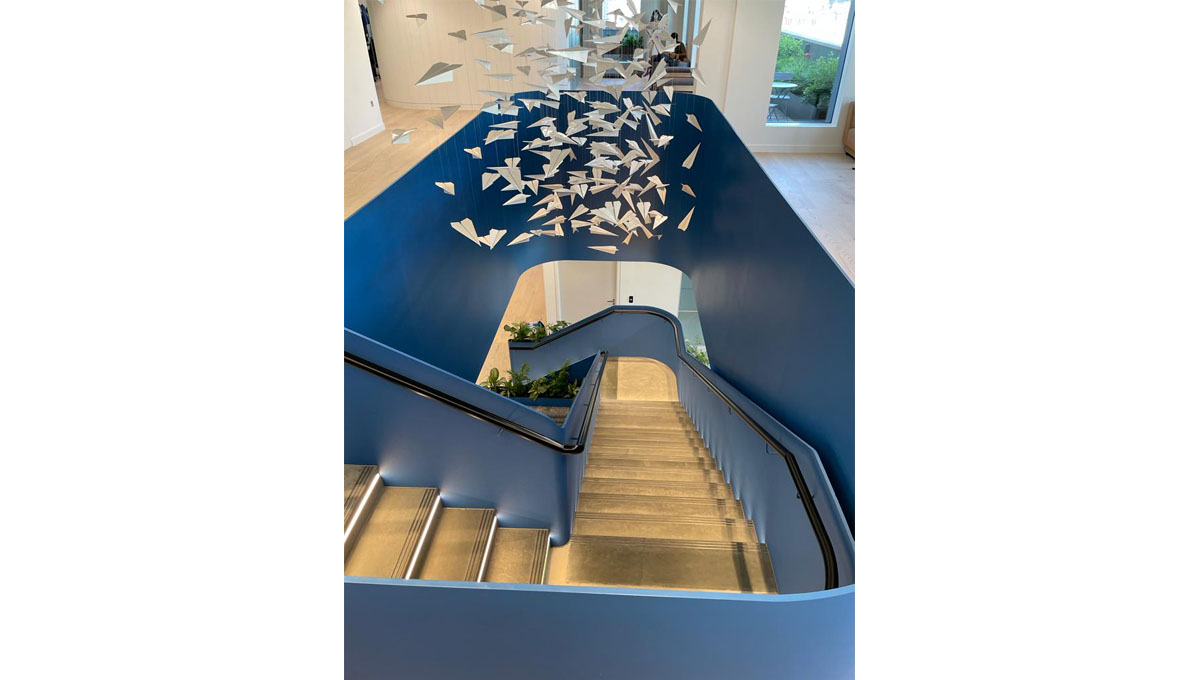 Visual concrete cladding for an internal staircase
