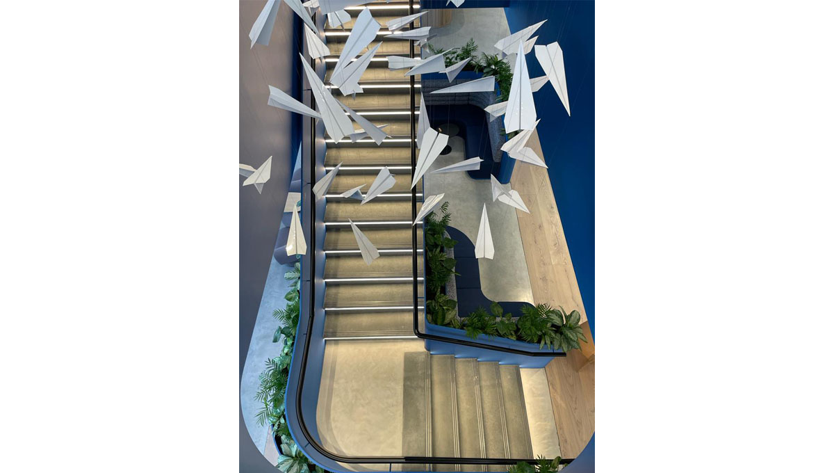 Visual concrete cladding for an internal staircase