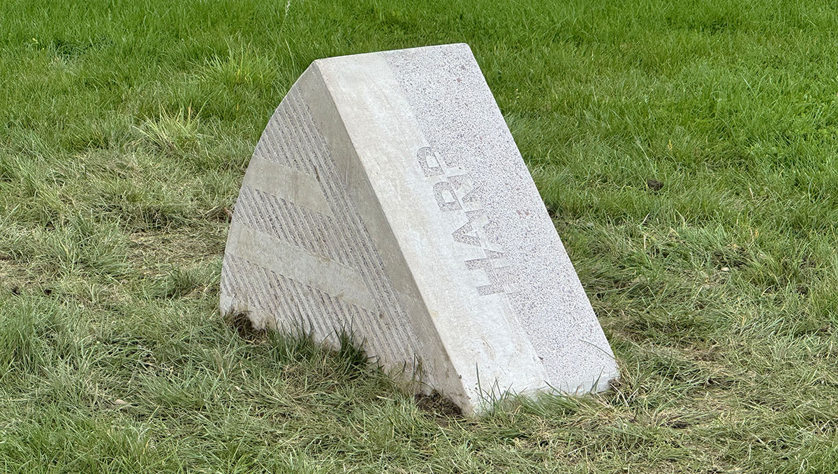 Visual Precast Concrete artwork of a mill wheel segment called a harp